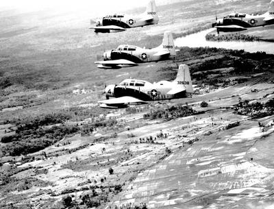 Vietnam: A-1E Skyraider aircraft of the 34th Tactical Group, based at Bien Hoa, South Vietnam, fly in formation over Sou-stock-photo