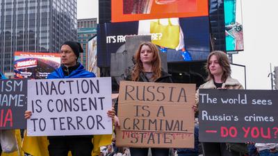 "ukrainian voices rise in times square rally after the attack"-stock-photo