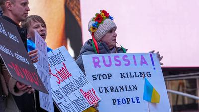 "ukrainian voices rise in times square rally after the attack"-stock-photo