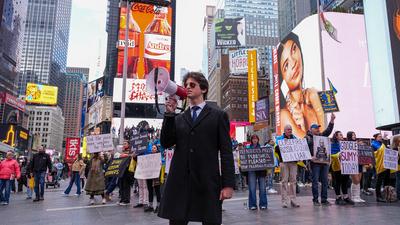 "ukrainian voices rise in times square rally after the attack"-stock-photo