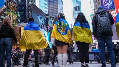 "ukrainian voices rise in times square rally after the attack"-stock-photo