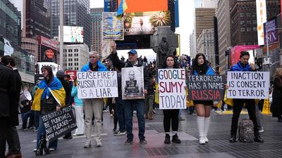 "ukrainian voices rise in times square rally after the attack"-stock-photo