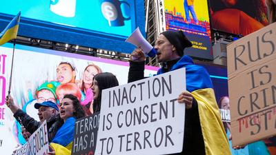 "ukrainian voices rise in times square rally after the attack"-stock-photo