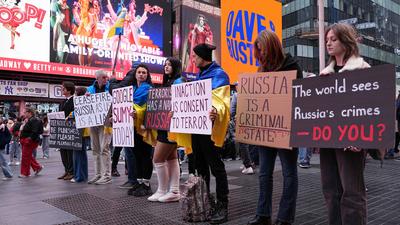"ukrainian voices rise in times square rally after the attack"-stock-photo