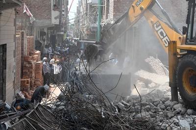11 Dead, 11 Injured As Four-Storey Building Collapses In Delhi?s Mustafabad-stock-photo