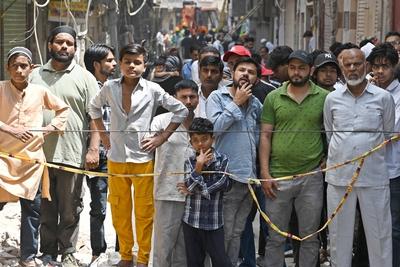 11 Dead, 11 Injured As Four-Storey Building Collapses In Delhi?s Mustafabad-stock-photo