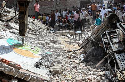 11 Dead, 11 Injured As Four-Storey Building Collapses In Delhi?s Mustafabad-stock-photo