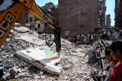 11 Dead, 11 Injured As Four-Storey Building Collapses In Delhi?s Mustafabad-stock-photo