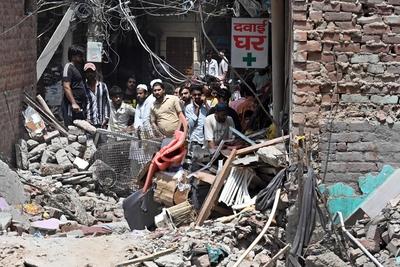 11 Dead, 11 Injured As Four-Storey Building Collapses In Delhi?s Mustafabad-stock-photo