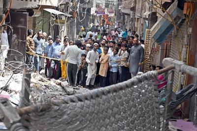 11 Dead, 11 Injured As Four-Storey Building Collapses In Delhi?s Mustafabad-stock-photo