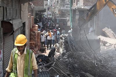11 Dead, 11 Injured As Four-Storey Building Collapses In Delhi?s Mustafabad-stock-photo