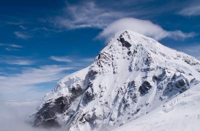 Viewpoint on Jungfraujoch Jungfraujoch in Swiss Alps showing station and distant peaks above clouds Copyright: xZoonar.c-stock-foto