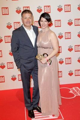 Ein Herz fuer Kinder - Charity Gala - Berlin Thomas Ruehmann and friend attending charity gala EIN HERZ FUER KINDER at-stock-foto