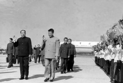 Cambodia: The Khmer Rouge top leadership at Pochentong Airport welcoming a Chinese delegation, c. 1976 Pol Pot (centre,-stock-photo