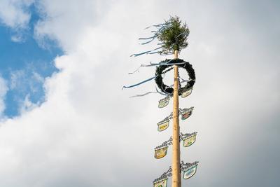 Stettenhofen, Bavaria, Germany - 02 May 2022: Decorative maypole festively decorated, traditional tree erected on 01 May-stock-foto