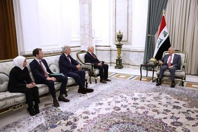Iraqi President Abdul Latif Jamal Rashid receives Michael Keating, Executive Director of the European Peace Institute-stock-photo
