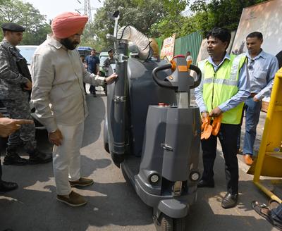 Delhi Environment Minister Manjinder Singh Sirsa Reviews Machines For Dust Mitigation, Pollution Control In Delhi-stock-photo