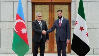Syrian President Ahmad al-Shara receives a delegation from Azerbaijan, headed by Azerbaijani Deputy Prime Minister Samir Sharifov-stock-photo