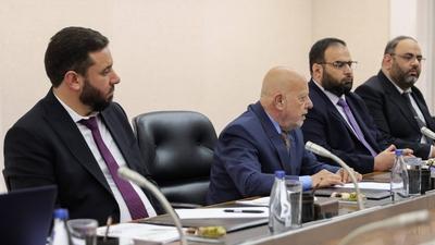 Syrian President Ahmad al-Shara meets with Minister of Economy and Industry Mohammad Nidal al-Shaar-stock-photo