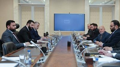 Syrian President Ahmad al-Shara meets with Minister of Economy and Industry Mohammad Nidal al-Shaar-stock-photo