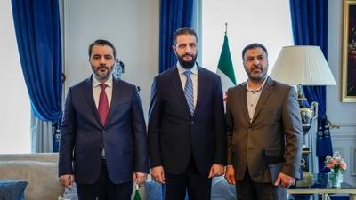 Syrian President Ahmed al-Sharaa meets with Farid Al-Methhane, a former military police officer in Damascus, During his visit to France-stock-photo