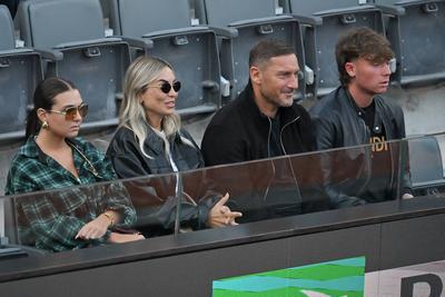 Francesco Totti with his partner Noemi Bocchi and his children Chanel and Cristian-stock-photo