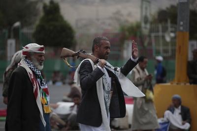 Houthi supporters protest against the US and Israel in Sana'a --stock-photo