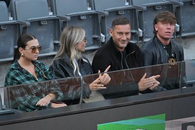 Francesco Totti with his partner Noemi Bocchi and his children Chanel and Cristian-stock-photo