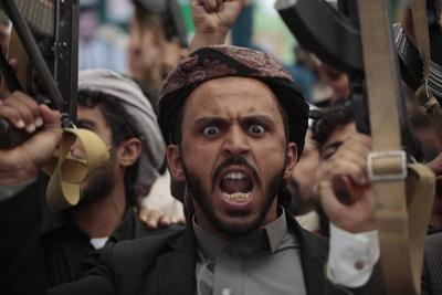Houthi supporters protest against the US and Israel in Sana'a --stock-photo