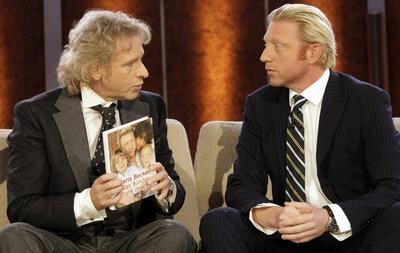 German presenter Thomas Gottschalk, left, talks to former tennis star Boris Becker, right, to present a book by Becker-stock-foto