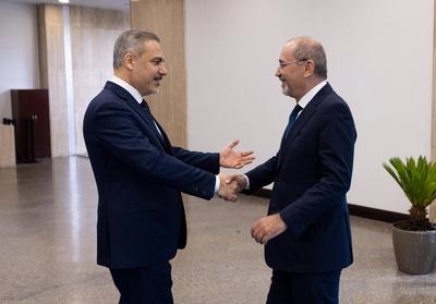 Turkish Foreign Minister Hakan Fidan meets with Ayman Safadi, Deputy Prime Minister and Minister of Foreign Affairs and Expatriates-stock-foto