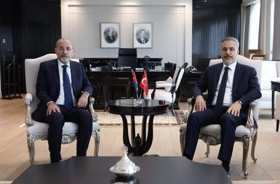 Turkish Foreign Minister Hakan Fidan meets with Ayman Safadi, Deputy Prime Minister and Minister of Foreign Affairs and Expatriates-stock-foto