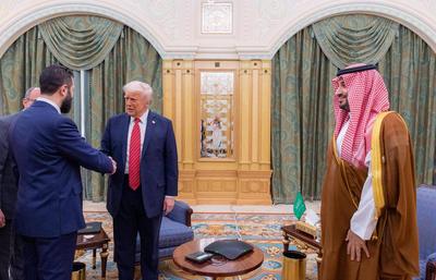 Saudi Crown Prince, Mohammed bin Salman, and US President, Donald Trump, meet with the Syrian president Ahmad Al-Sharaa-stock-photo