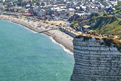 Etretat Normandy France. Tourists on top of the chalk cliffs Etretat Normandy France. Tourists on top of the chalk cliff-stock-foto