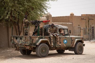 Soldiers from the Malian armed forces (FAMa) secure the Place Sankore during an official visit by a foreign delegation a-stock-photo
