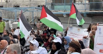 Palestinians attend an event marking the 77th anniversary of the Nakba at Al-Jaouni School, which houses displaced persons-stock-foto