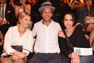 RIANI - Mercedes-Benz Fashion Week - Berlin Anne-Sophie Briest,Peer Kusmagk and Anouschka Renzi attending the RIANI fash-stock-foto