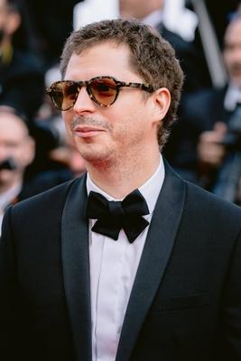 78eme Festival International du Film de Cannes. Mont?e des marches du film The Phoenician Theme. BAELEN-stock-photo
