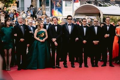 78eme Festival International du Film de Cannes. Mont?e des marches du film The Phoenician Theme. BAELEN-stock-photo