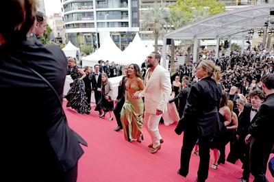 78eme Festival International du Film de Cannes. Mont?e des marches du film Highest 2 Lowest. ARNAL-stock-photo