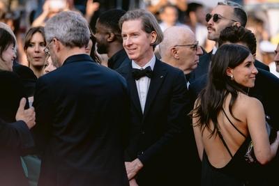 78eme Festival International du Film de Cannes. Mont?e des marches du film The Phoenician Theme. BAELEN-stock-photo
