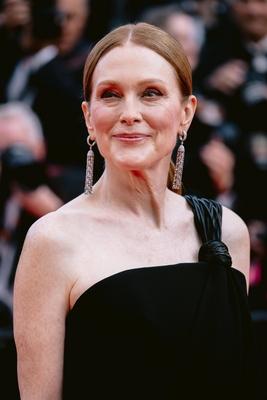 78eme Festival International du Film de Cannes. Mont?e des marches du film The Phoenician Theme. BAELEN-stock-photo