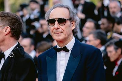 78eme Festival International du Film de Cannes. Mont?e des marches du film The Phoenician Theme. BAELEN-stock-photo