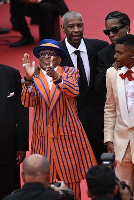 78eme Festival International du Film de Cannes. Mont?e des marches du film Highest 2 Lowest. ARNAL-stock-photo
