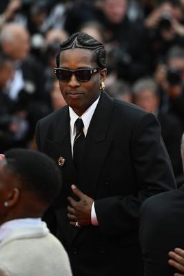 78eme Festival International du Film de Cannes. Mont?e des marches du film Highest 2 Lowest. ARNAL-stock-photo