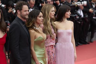 CANNES, FRANCE - MAY 19: (L-R) American film director Kyle Marvin, American actress Adria Arjona, film producer Ro Donne-stock-photo
