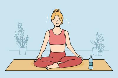 Ruhige Frau ?bt Yoga zu Hause-stock-photo