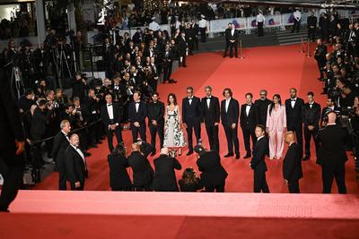 78eme Festival International du Film de Cannes. Mont?e des marches du film 13 jours 13 nuits. ARNAL-stock-photo
