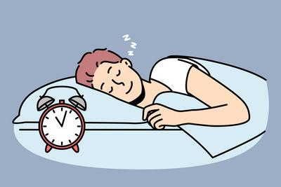 Gl?cklicher Mann liegt im Bett und schl?ft-stock-photo