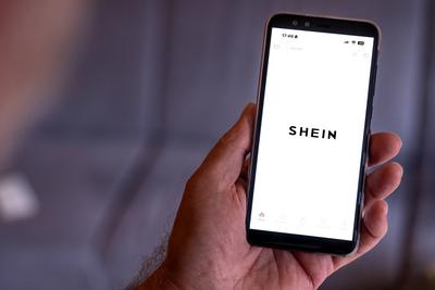 Bavaria, Germany - May 22, 2025: PHOTOMONTAGE, home screen of the Shein app on a smartphone - the black logo appears whe-stock-foto